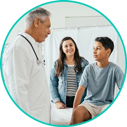 Healthcare provider discussing personalized ADHD treatment with a parent and child