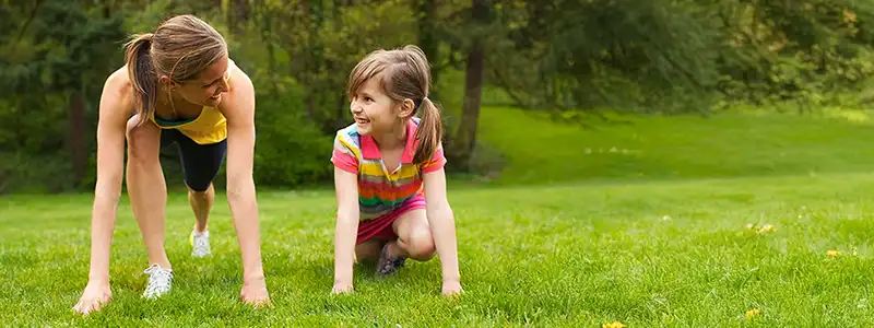 Parent and child outdoors learning more about RELEXXII for ADHD